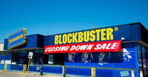Blogs 1 Blockbuster store with a "Closing Down Sale" banner, representing the risk financial advisors face if they fail to evolve—something Financial Gravity helps prevent.