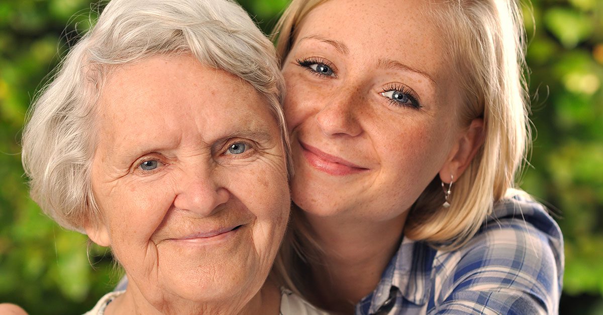 Smiling senior woman with her adult granddaughter—symbolizing family legacy and the human side of wealth planning that advisors deliver with Financial Gravity’s support.