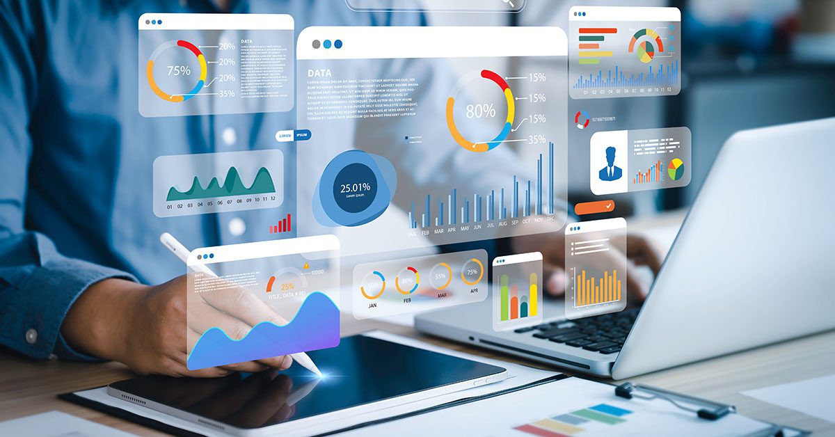 A financial advisor analyzing marketing performance data on a tablet and laptop, with dynamic charts and graphs illustrating campaign results, representing how Financial Gravity’s marketing solutions help advisors drive growth and enterprise value.