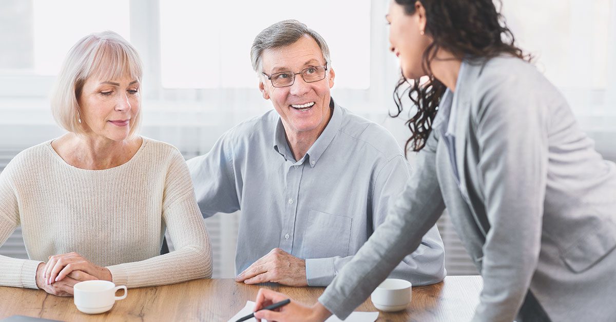 A financial advisor discusses generational wealth strategies with clients as part of Financial Gravity’s multi-family office solutions.